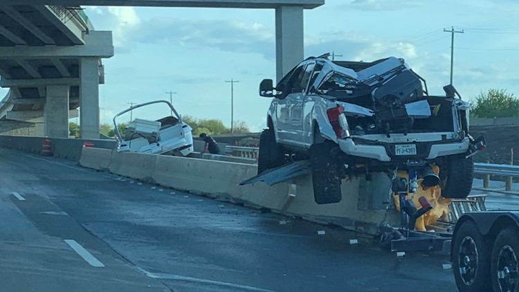 Boat launches off trailer after pickup truck crashes into barrier on I-35W in Fort Worth, police say