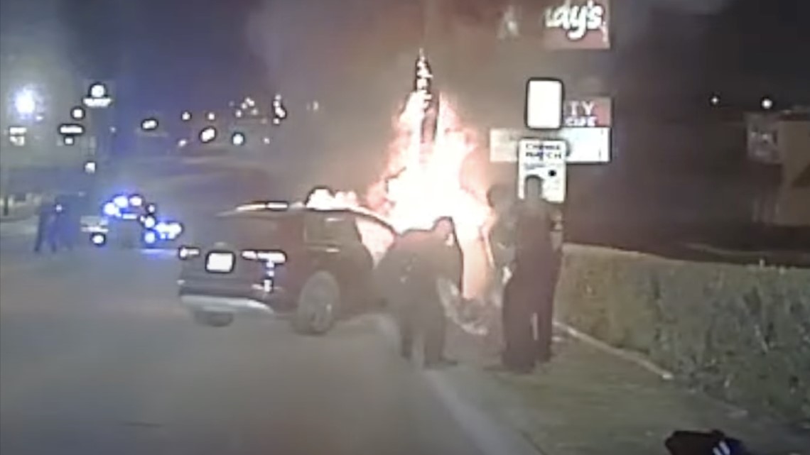 White Settlement, TX: Police officers rescue man from burning car ...