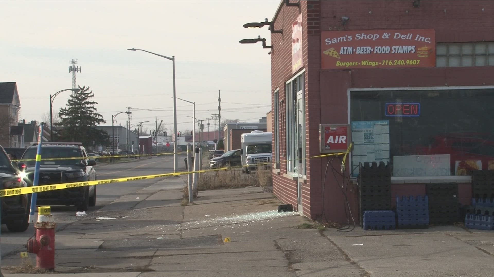 Witness describes diving behind counter during Christmas Day shooting
