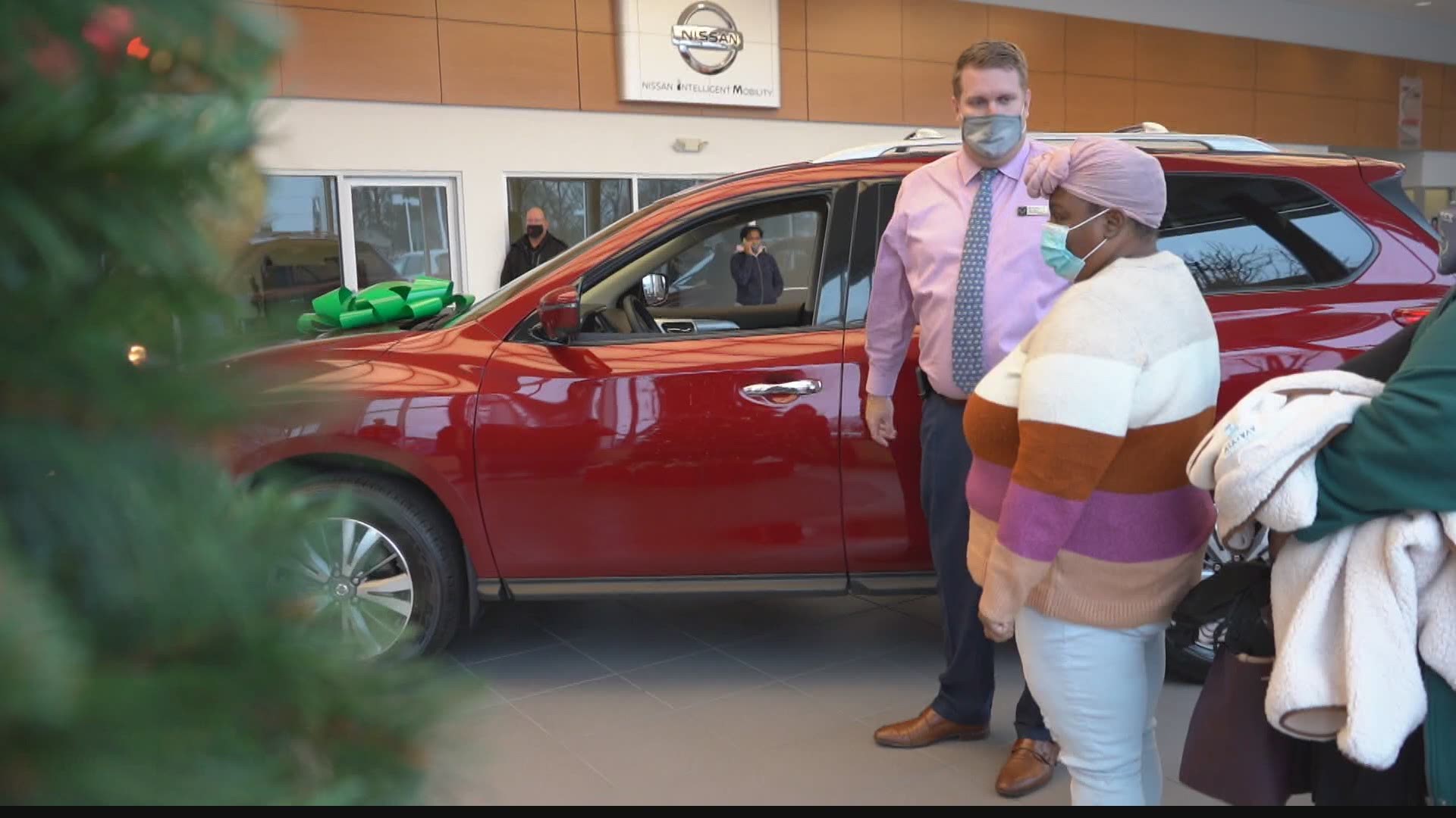 The woman who works overtime to buy gifts for others got one of her own Thursday.