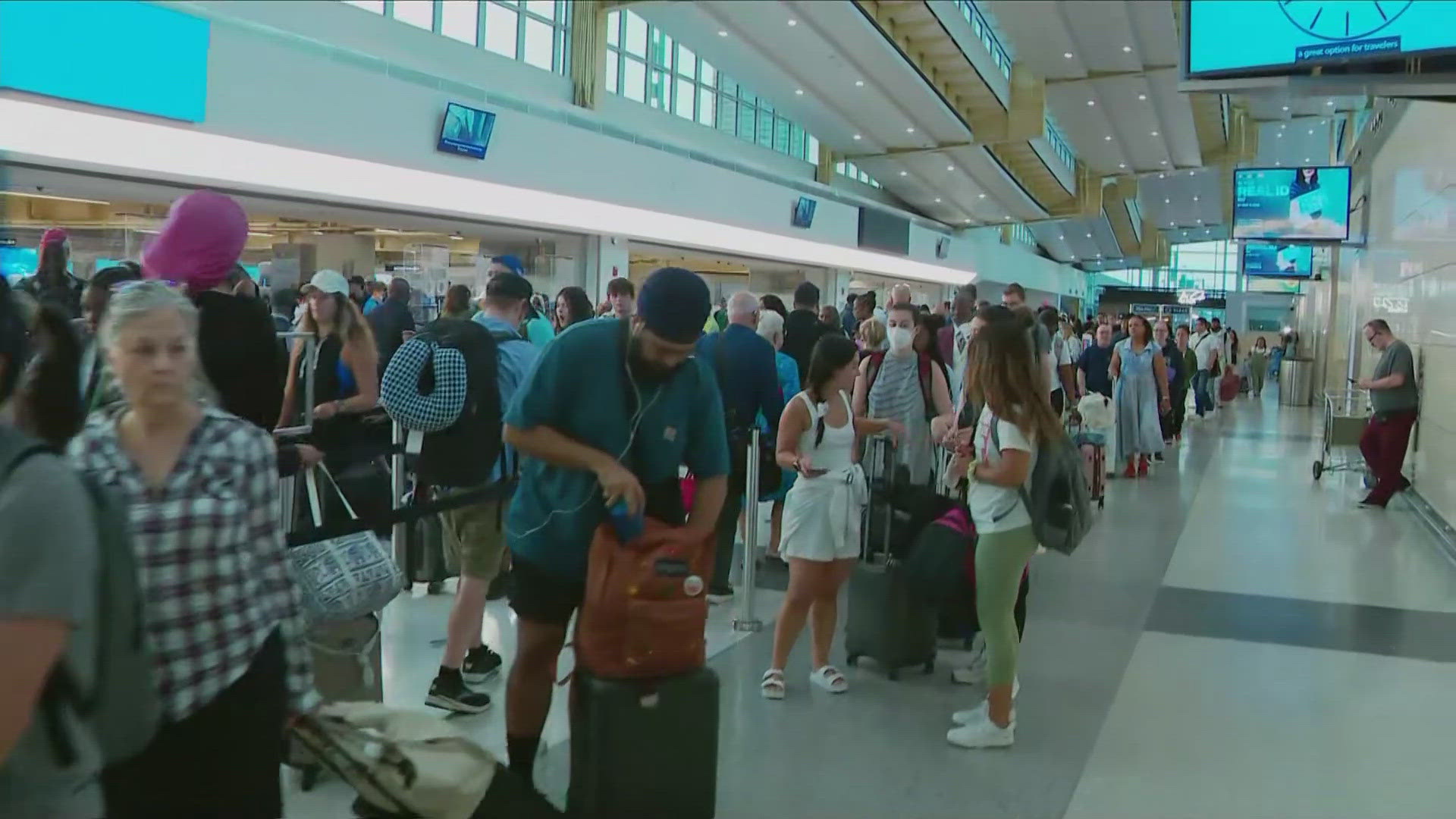 Despite seeing delays start to roll in at DCA, travelers were in good spirits Friday morning as widespread outages were worked through.