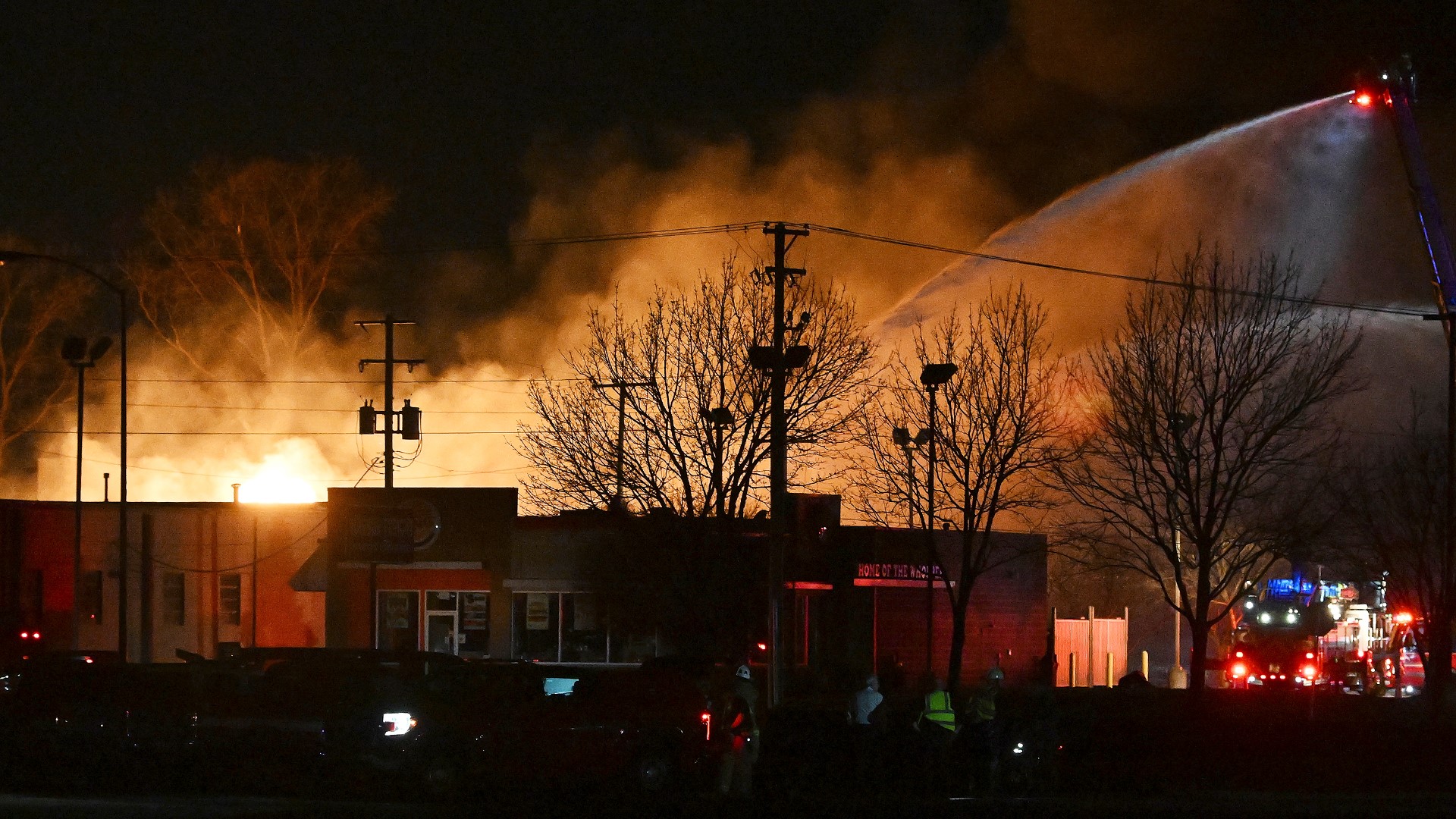 The Clinton Township Police Department said debris was sent into the air and came down as far as a mile away.